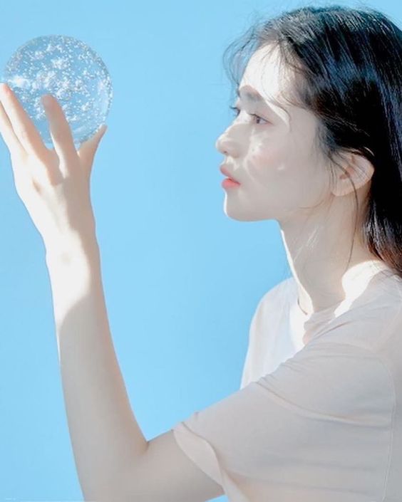 girl with a crystal ball