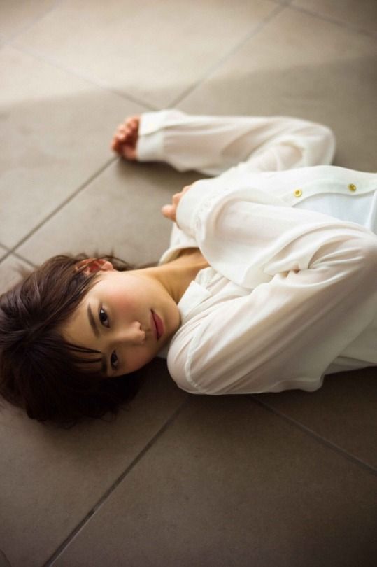 woman lying on floor