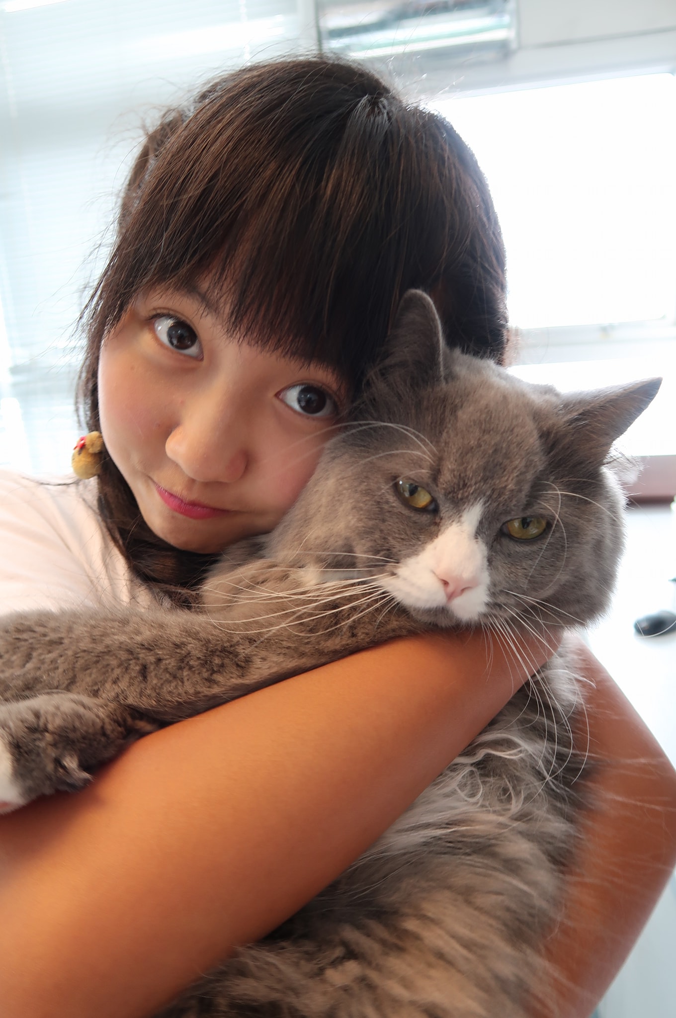 當年5歲的小妹妹轉眼間將滿14歲,不變的是包包面仍然可愛又討喜。