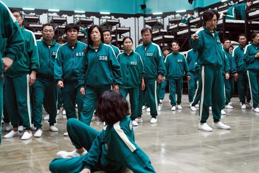 身穿綠色運動服,用色相當大膽