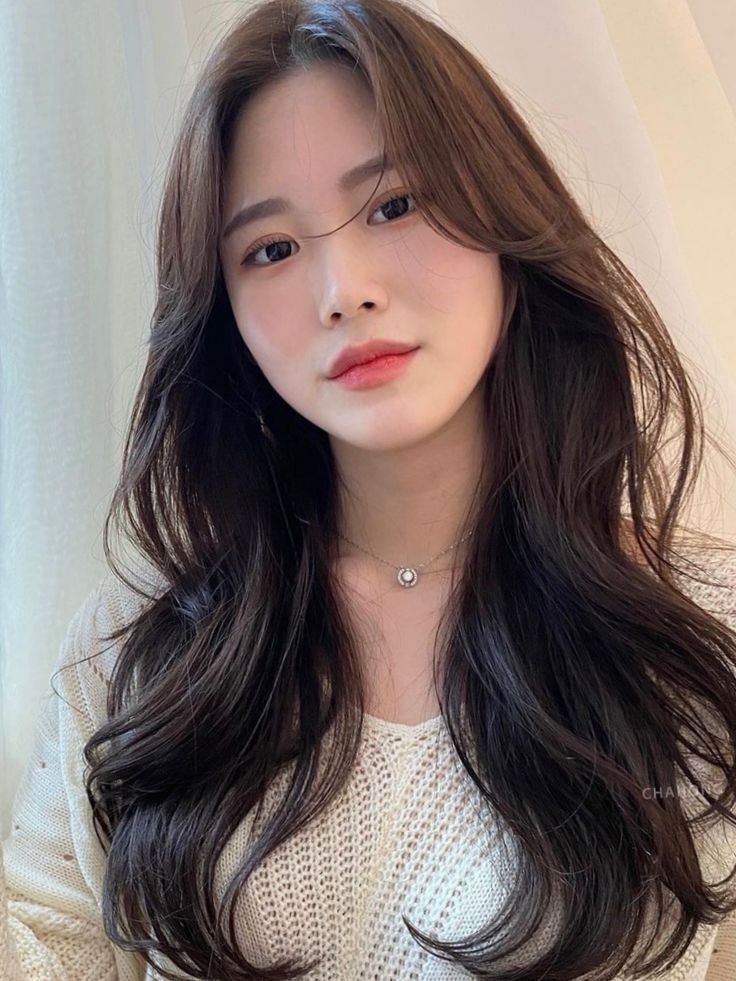 這款法式慵懶捲帶點隨性、凌亂感。