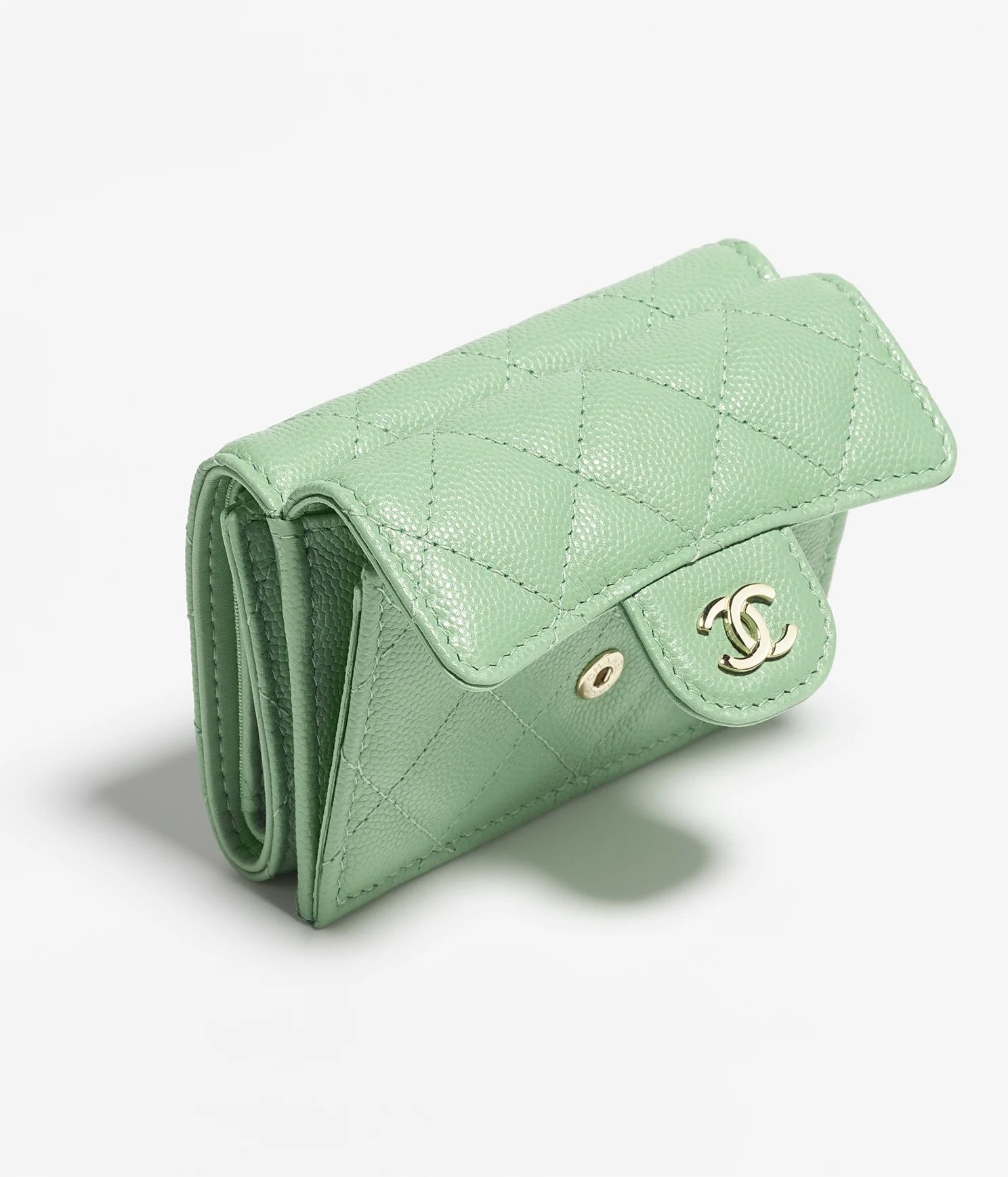 銀包設有一個放置紙幣口袋及一個存放零錢的翻蓋口袋。