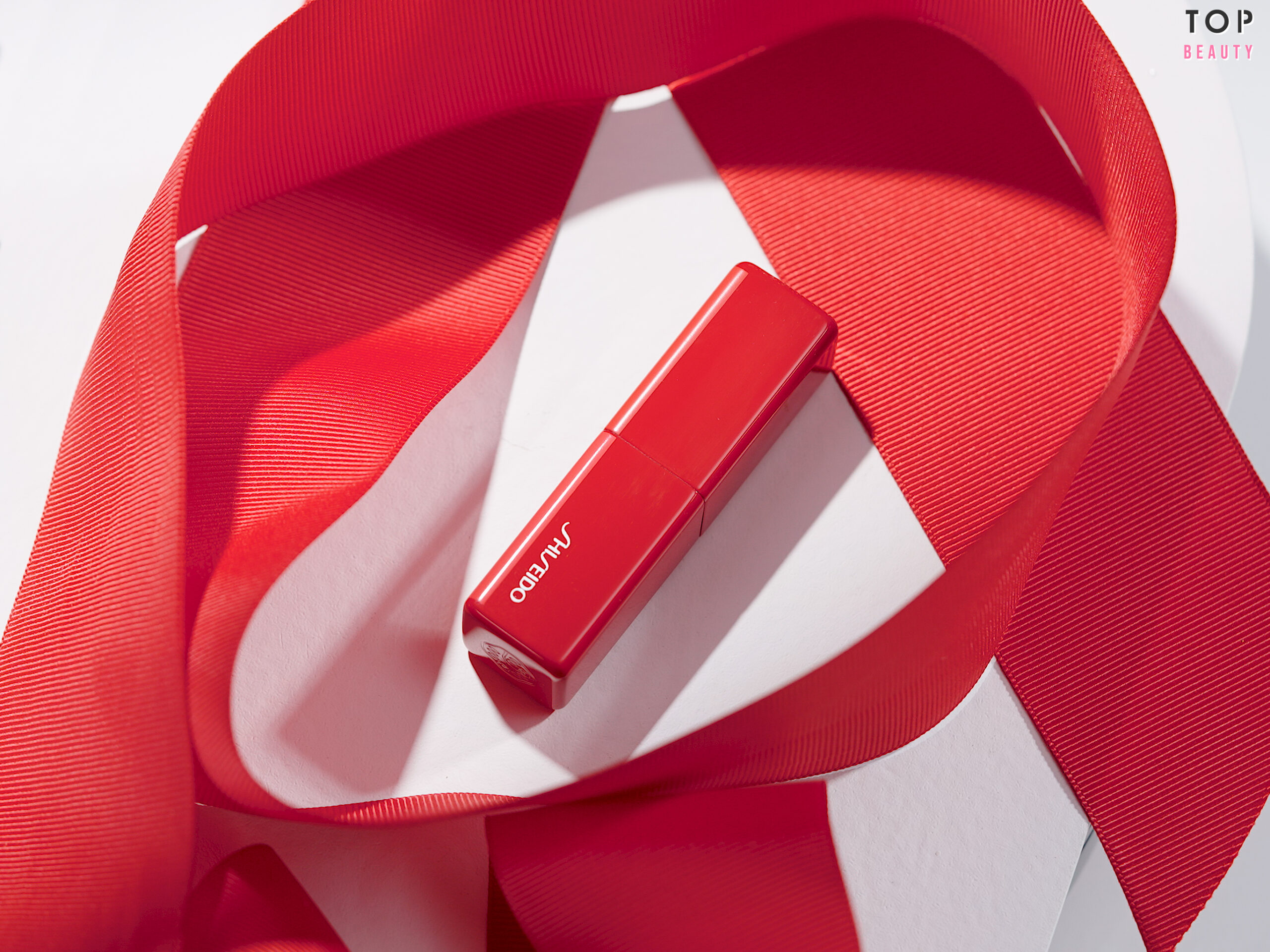 SHISEIDO 緞光凝亮唇膏 $250