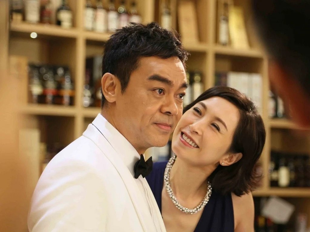 劉青雲與郭藹明結婚25年一直恩愛如昔。