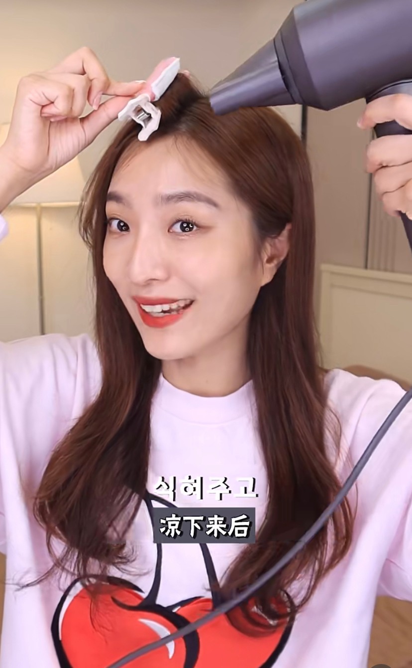 用吹風筒加熱後再拿下來。