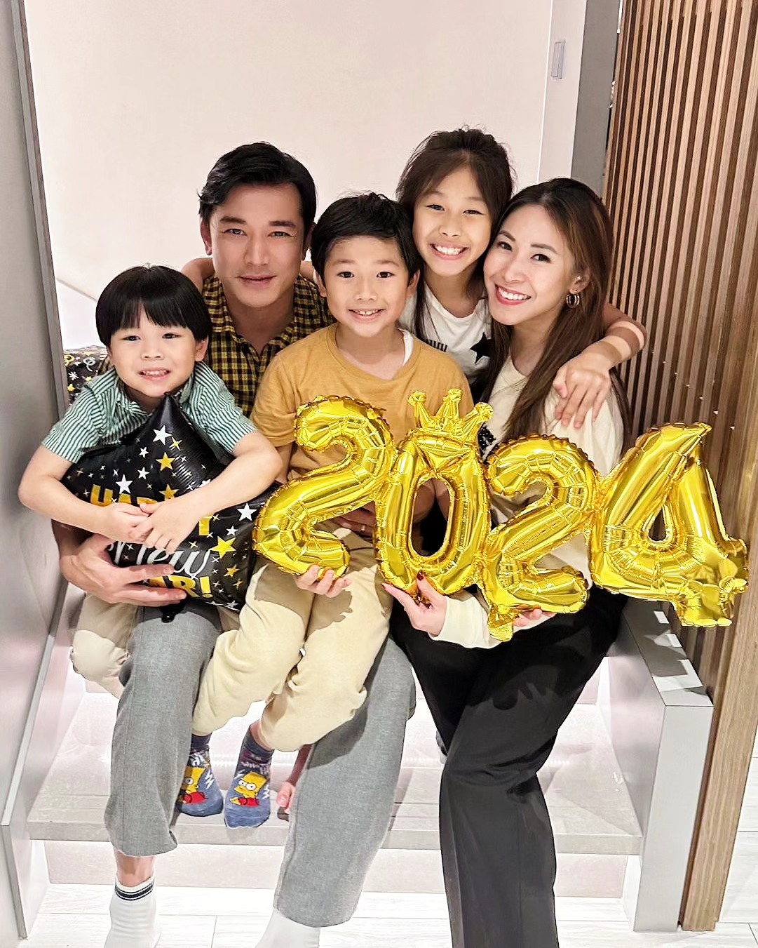 黃祥興現在一家五口生活美滿。